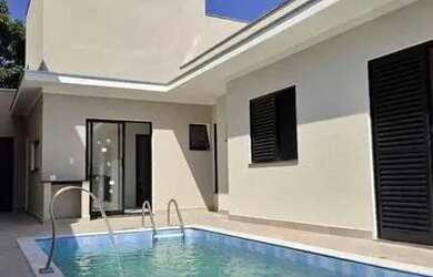 Imagem: A casa possui 3 Dormitórios, 2 Banheiros, 2 Vagas na garagem