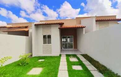 Imagem: A casa possui 3 Dormitórios, 2 Banheiros, 3 Vagas na garagem