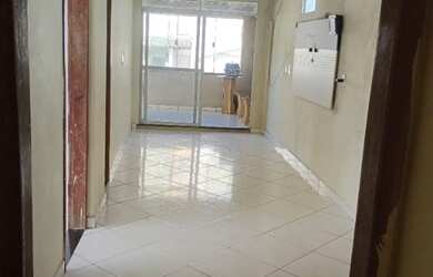 Imagem 4: Vendo uma casa em Guarapari no bairro coroado. A casa tem três quartos sala espaçosa