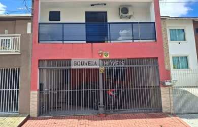 Imagem: A casa possui 4 Dormitórios, 2 Banheiros, 2 Vagas na garagem