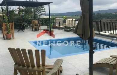 Imagem: A casa em condomínio possui 4 Dormitórios, 5 Banheiros, 5