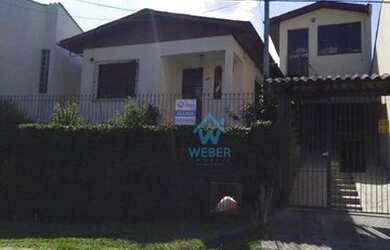 Imagem: A casa possui 2 Dormitórios, 1 Banheiro, 1 Vaga na garagem