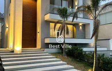 Imagem: A casa em condomínio possui 4 Dormitórios, 5 Banheiros, 4