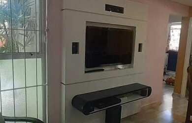 Imagem: O apartamento possui 2 Dormitórios, 1 Banheiro, 1 Vaga na garagem