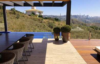 Imagem: A casa em condomínio possui 4 Dormitórios, 4 Banheiros, 5