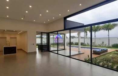 Imagem: A casa em condomínio possui 4 Dormitórios, 5 Banheiros, 4