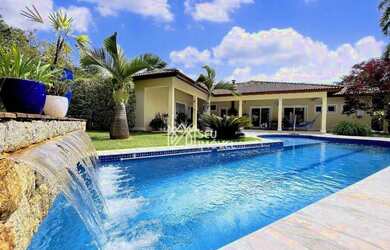 Imagem: A casa em condomínio possui 4 Dormitórios, 5 Banheiros, 5