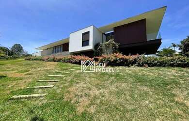 Imagem: A casa em condomínio possui 5 Dormitórios, 5 Banheiros, 5