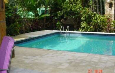 Imagem: A casa em condomínio possui 4 Dormitórios, 3 Banheiros, 5