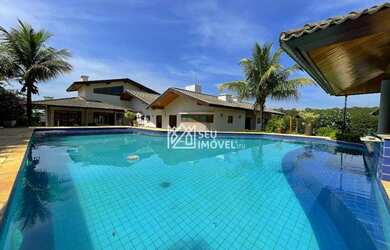 Imagem: A casa em condomínio possui 5 Dormitórios, 5 Banheiros, 5