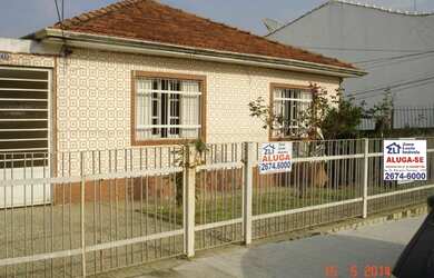 Imagem: A casa possui 3 Dormitórios, 2 Banheiros, 4 Vagas na garagem