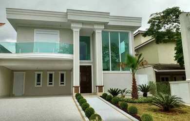 Imagem: A casa em condomínio possui 4 Dormitórios, 5 Banheiros, 2