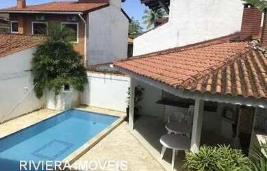 Imagem: A casa possui 4 Dormitórios, 5 Banheiros, 3 Vagas na garagem