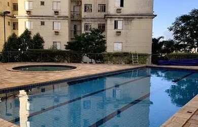 Imagem: O apartamento possui 2 Dormitórios, 1 Banheiro, 2 Vagas na