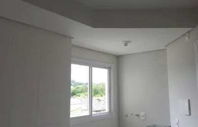 Imagem: O apartamento possui 2 Dormitórios, 1 Banheiro, 1 Vaga na garagem