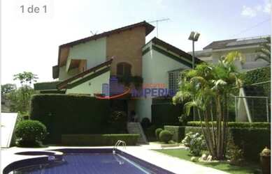 Imagem: A casa em condomínio possui 5 Dormitórios, 5 Banheiros, 5