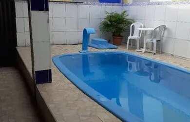 Imagem: A casa possui 2 Banheiros, 1 Vaga na garagem e está localizado