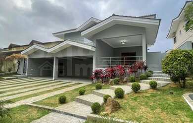 Imagem: A casa em condomínio possui 4 Dormitórios, 5 Banheiros, 4