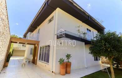 Imagem: A casa possui 5 Dormitórios, 4 Banheiros, 5 Vagas na garagem