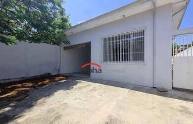 Imagem: A casa possui 2 Dormitórios, 1 Banheiro, 2 Vagas na garagem