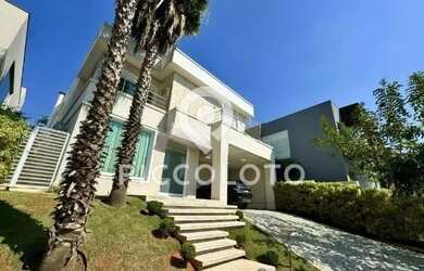 Imagem: A casa em condomínio possui 4 Dormitórios, 5 Banheiros, 4