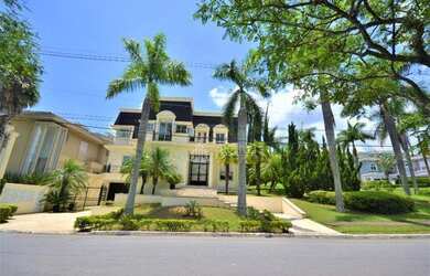 Imagem: A casa em condomínio possui 5 Dormitórios, 5 Banheiros, 5