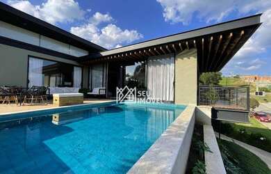 Imagem: A casa em condomínio possui 4 Dormitórios, 5 Banheiros, 5