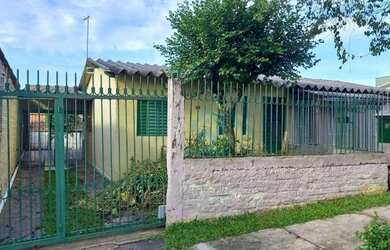 Imagem: A casa possui 2 Dormitórios, 1 Banheiro, 3 Vagas na garagem