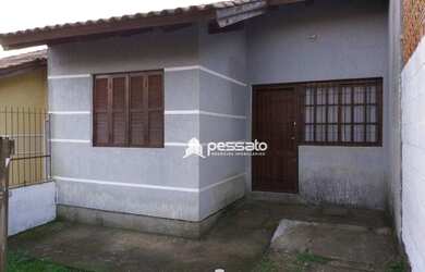 Imagem: A casa possui 2 Dormitórios, 1 Banheiro, 1 Vaga na garagem