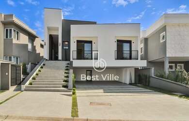 Imagem: A casa em condomínio possui 4 Dormitórios, 5 Banheiros, 5