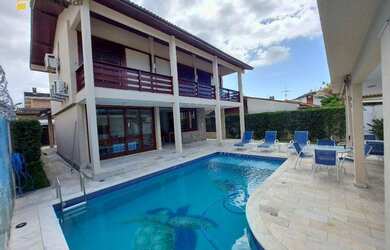 Imagem: A casa possui 5 Dormitórios, 5 Banheiros, 4 Vagas na garagem