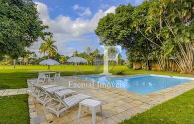 Imagem: A casa possui 5 Dormitórios, 5 Banheiros, 5 Vagas na garagem