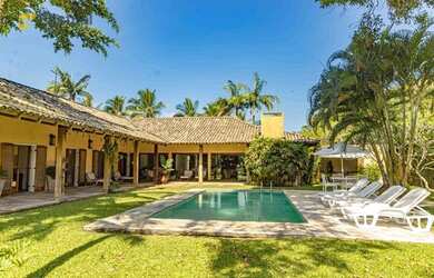 Imagem: A casa possui 4 Dormitórios, 5 Banheiros, 5 Vagas na garagem