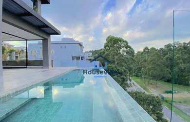 Imagem: A casa em condomínio possui 4 Dormitórios, 5 Banheiros, 5