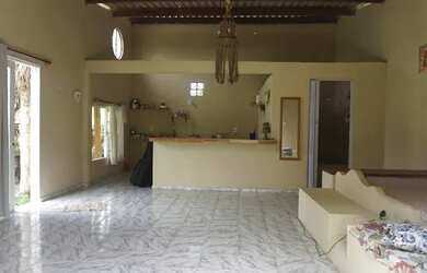 Imagem: A casa possui 1 Dormitório, 1 Banheiro, 1 Vaga na garagem