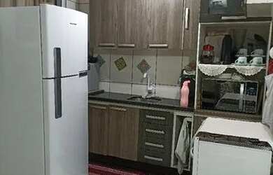 Imagem: A casa possui 2 Dormitórios, 1 Banheiro, 2 Vagas na garagem