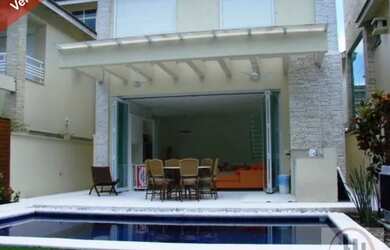 Imagem: A casa em condomínio possui 4 Dormitórios, 5 Banheiros, 4