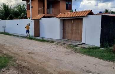 Imagem: A casa possui 3 Dormitórios, 3 Banheiros, 3 Vagas na garagem