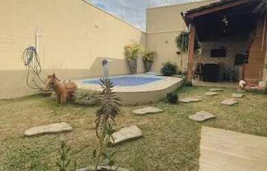 Imagem: A casa possui 3 Dormitórios, 3 Banheiros, 3 Vagas na garagem