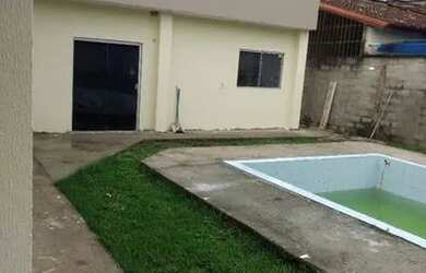 Imagem: A casa possui 3 Dormitórios, 4 Banheiros, 5 Vagas na garagem