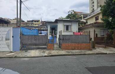 Imagem: A casa possui 4 Dormitórios, 2 Banheiros, 3 Vagas na garagem