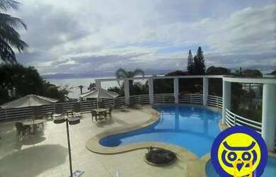 Imagem: O apartamento possui 3 Dormitórios, 1 Banheiro, 2 Vagas na