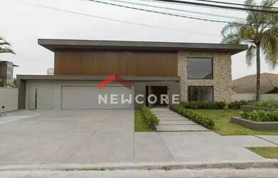 Imagem: A casa em condomínio possui 5 Dormitórios, 5 Banheiros, 5