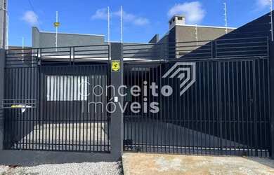 Imagem: A casa possui 3 Dormitórios, 2 Banheiros, 2 Vagas na garagem