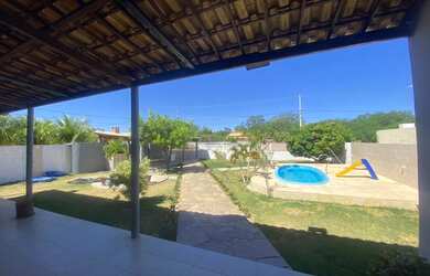 Imagem: A casa para temporada possui 2 Dormitórios e 2 Vagas na garagem