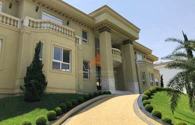 Imagem: A casa em condomínio possui 5 Dormitórios, 5 Banheiros, 5