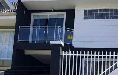 Imagem: A casa em condomínio possui 3 Dormitórios, 3 Banheiros, 2