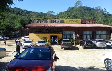 Imagem: A casa possui 5 Dormitórios, 5 Banheiros, 4 Vagas na garagem