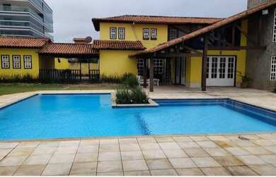 Imagem: A casa possui 5 Dormitórios, 5 Banheiros, 5 Vagas na garagem