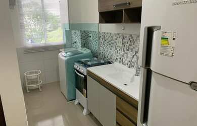 Imagem: O apartamento possui 2 Dormitórios, 1 Banheiro, 1 Vaga na garagem